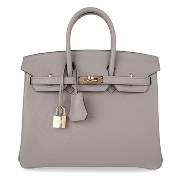 Muted Ash Grey Soft Uniform Pebble Grain Medium Structured Hand Tote With Luminous Golden Twist Lock Hardware And Matching Grey Suspended Metal Padlock Charm