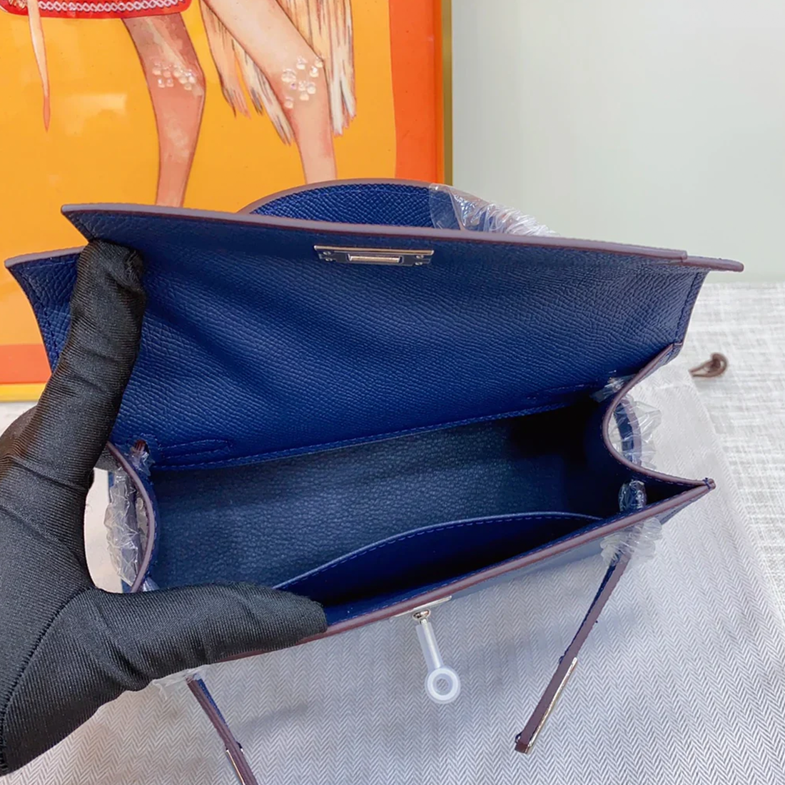 Vivid Electric Royal Blue Fine Compact Grain Petite Trapezoid Hand Bag With Polished Silvery Twist Lock Flap Hardware And Side Metal Carry Fixture Rings