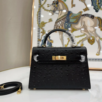 Sleek Jet Black Tiny Uniform Dotted Petite Sharp Trapezoid Tote With Luminous Golden Twist Lock Flap Hardware And Side Metal Connection Fixtures